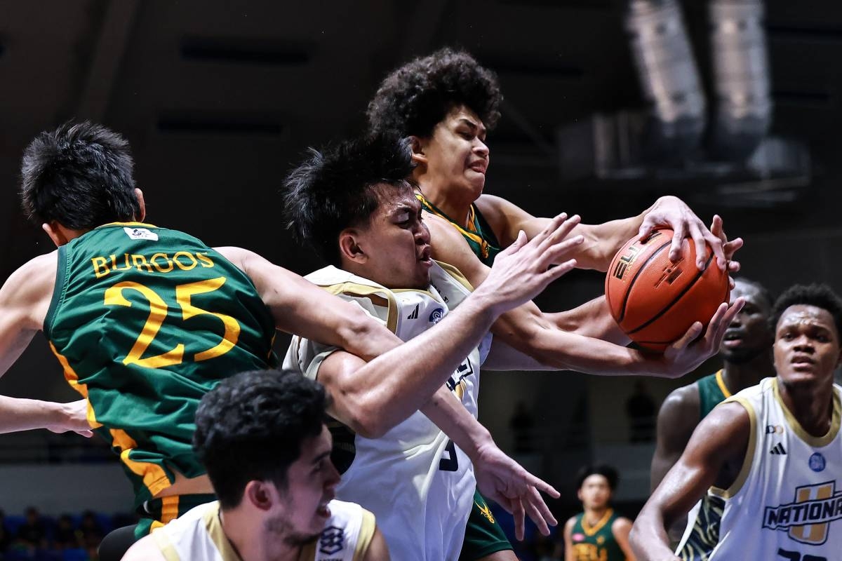NU's PJ Palacielo battles for the rebound against FEU during the UAAP Season 89 men's basketball at the Ateneo Blue Eagle Gym in Quezon City on October 18, 2026. Photo by Rio Deluvio