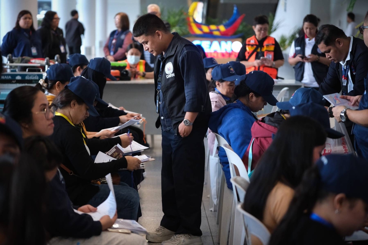 Thirty-four Overseas Filipino Workers (OFWs) arrive at Ninoy Aquino International Airport Terminal 3 in Pasay City on Oct. 19, 2026, marking the return of the first batch of repatriates from Saudi Arabia assisted by the Overseas Workers Welfare Administration (OWWA) and Department of Migrant Workers (DMW). They returned to the country following flight disruptions in Riyadh. In line with President Ferdinand R. Marcos Jr.’s directive under the UPLIFT Assistance Program, the returning workers received airport, lodging, and transport support upon arrival. At least 65 repatriated OFWs are expected to arrive on Oct. 20 as government agencies continue operations using the supplemental Emergency Repatriation Fund. PHOTOS BY J. GERARD SEGUIA