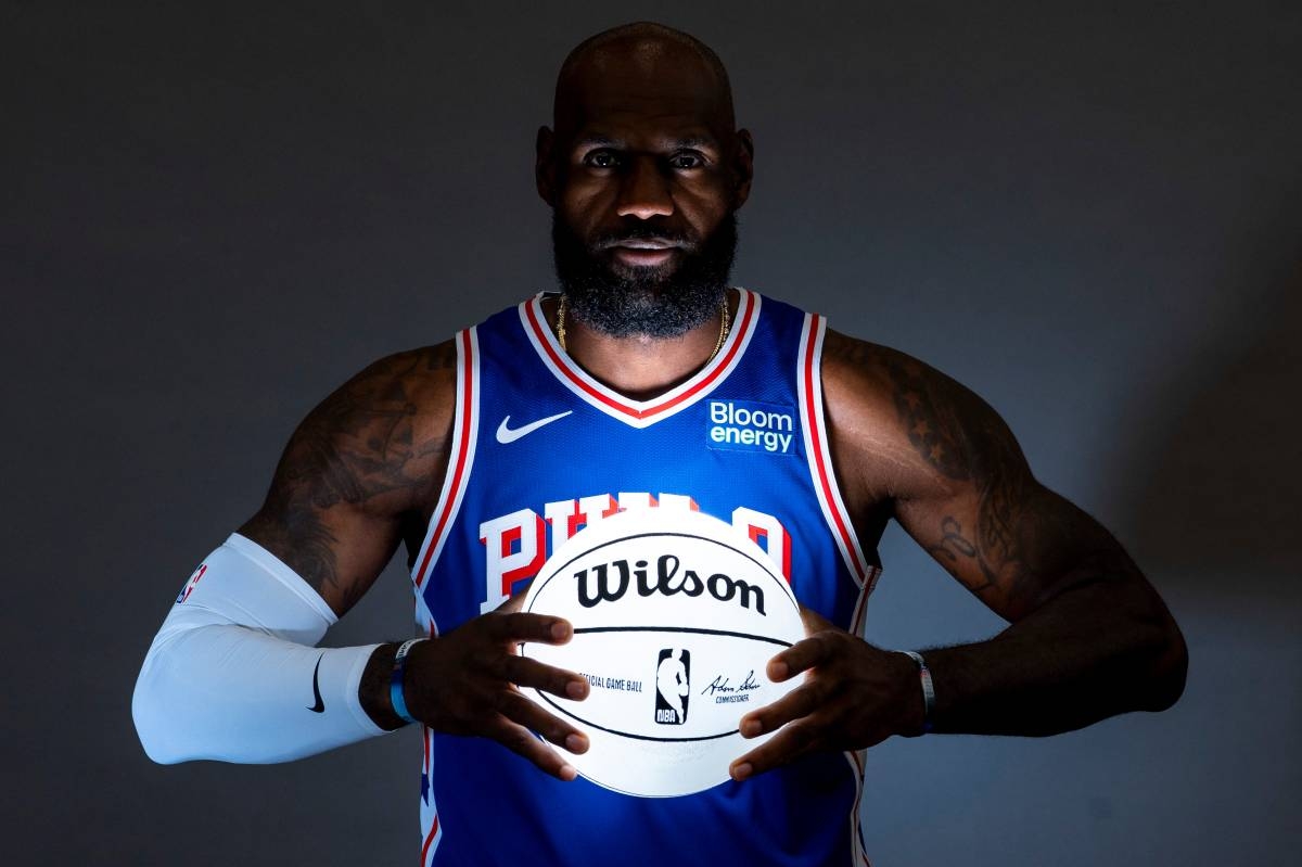 Philadelphia 76ers' LeBron James poses for photos during the NBA basketball team's media day, Monday, Sept. 28, 2026, in Camden, N.J.. (AP Photo/Chris Szagola)
