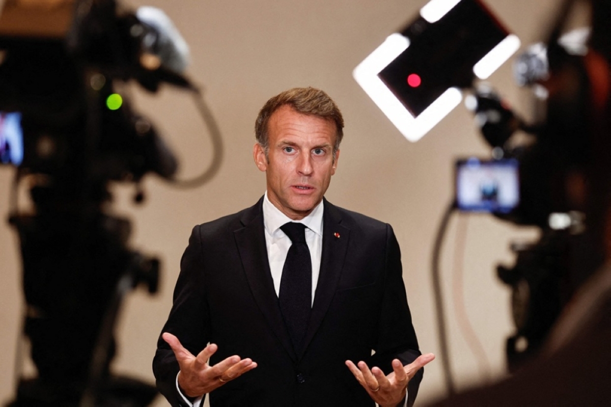 IN THE SPOTLIGHT France's President Emmanuel Macron speaks to members of the media during the 9th Annual One Planet Sovereign Wealth Funds (OPSWF) Summit in the city of Lusail, eastern Qatar, on Oct. 21, 2026. AFP PHOTO