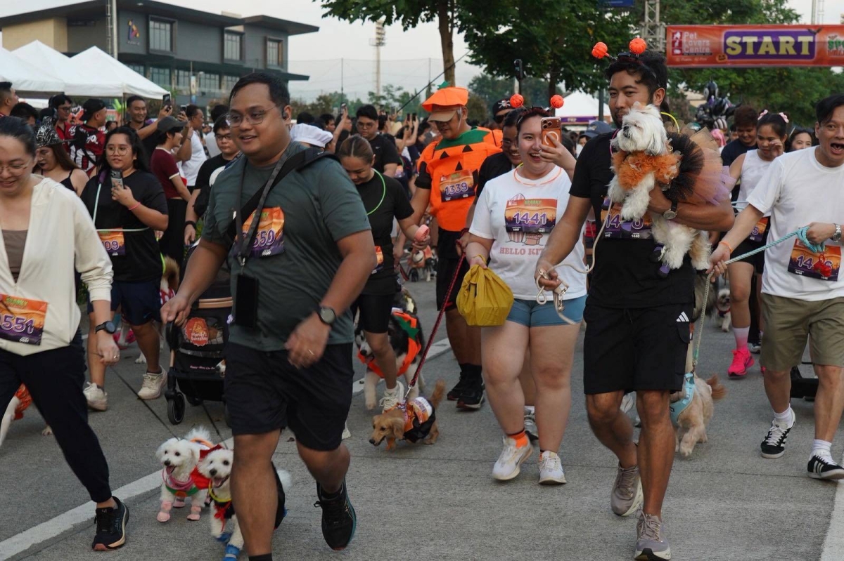 Fur parents join the annual pet lovers' Halloween Walkathon at Bridgetowne in Quezon City on Oct. 24, 2026. PHOTOS BY JOHN ORVEN VERDOTE