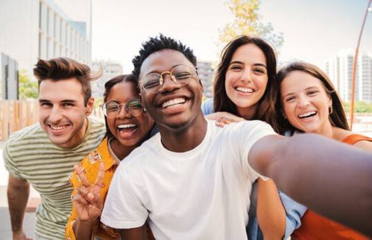 Smiling regularly may be good for your mood, health – experts