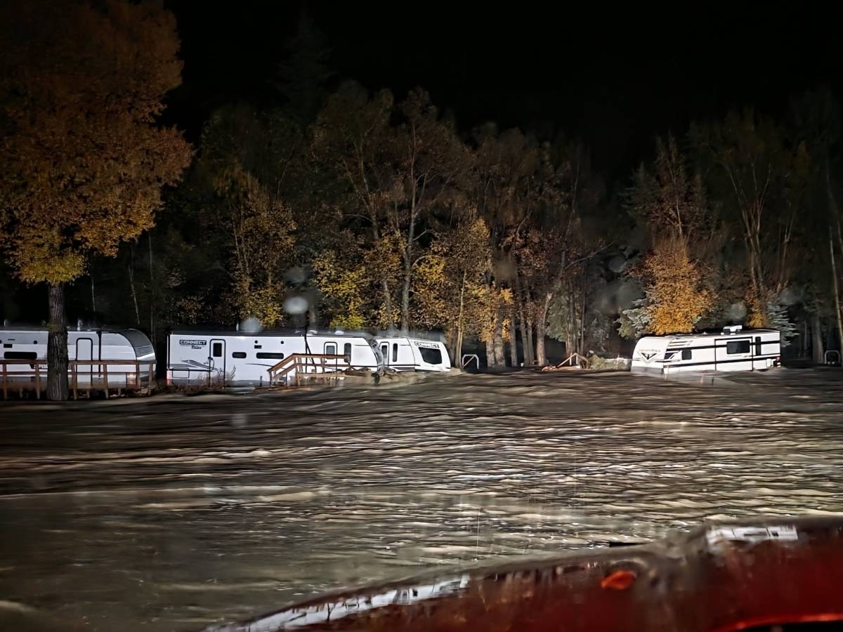 Floodwaters surround trailers at the Fun Valley Family Resort campground and RV part in South Fork, Colo., early Friday, Oct. 23, 2026. (South Fork Fire Rescue via AP)