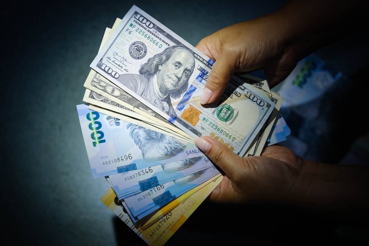 Peso sinks to new record low