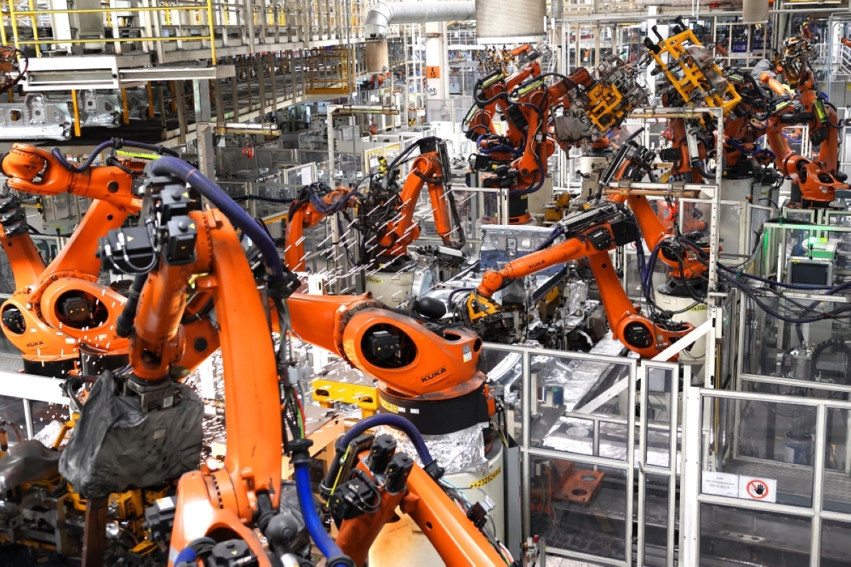EXPORT Robotic arms are seen at a final assembly workshop of the FAW-Volkswagen factorty in Qingdao, Shandong province, on Oct. 19, 2026. Volkswagen is looking to export at least 300,000 vehicles made in China each year as it tries to overcome competition and slow growth in China. AFP PHOTO
