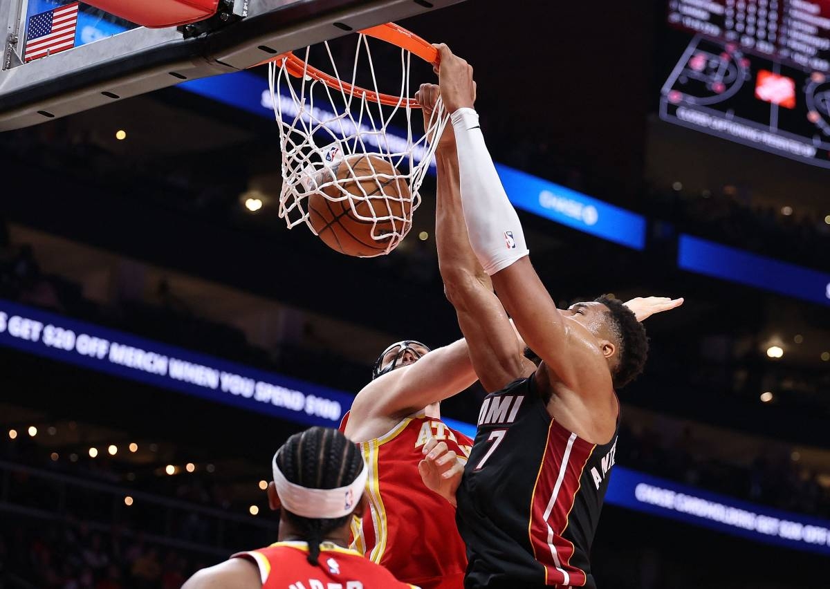 Heat earn first win of NBA season