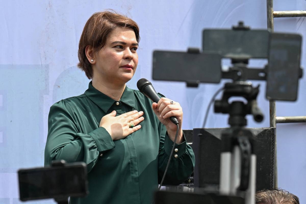 Vice President Sara Duterte talks to her supporters outside the city hall in Quezon City, Metro Manila on September 11, 2026. AFP PHOTO