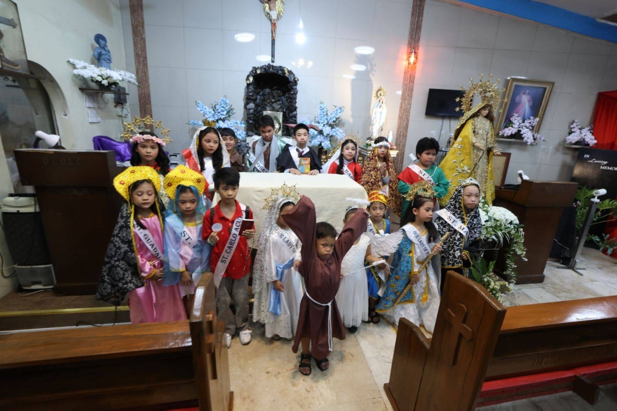 Children prepare for the Parade of Saints at the Our Lady of Lourdes Mission Station in Blumentritt in Manila on Oct. 30, 2026. PHOTOS BY RENE H. DILAN