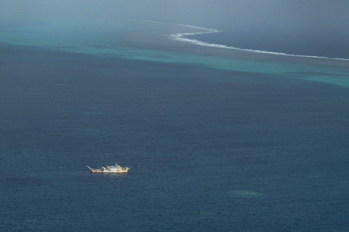 China boosts patrols around disputed shoal