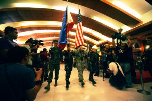 The Philippine and United States flags are carried out of the conference hall in Camp Aguinaldo on Friday after ceremonies officially closing this year’s Balikatan joint military exercises. PHOTO BY MIGUEL DE GUZMAN