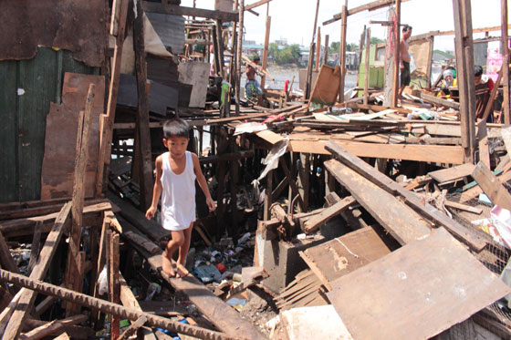 Hundreds of shanties along the Maricaban creek in Pasay City were demolished on Friday in an effort to rehabilitate the waterway. The residents affected will be relocated to  Trece Martirez City in Cavite.  Photo By Ruy L. Martinez 