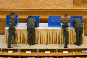 JUNTA DEMOCRACY Military members of parliament cast their votes on a draft amendment to the constitution at a session of parliament in Naypyidaw on June 25, 2015. Myanmar’s parliament on June 25 dealt a decisive blow to Aung San Suu Kyi’s hopes of amending the juntaera constitution that bars her from the presidency ahead of landmark elections, voting down a bill that would have ended the military’s effective veto on charter change.  AFP PHOTO