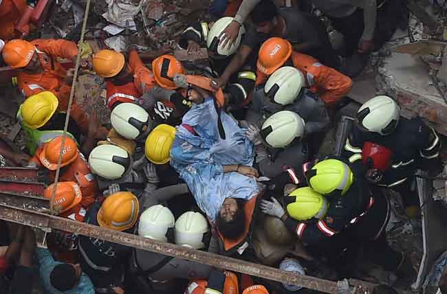 India Building Collapses; People Trapped | The Manila Times